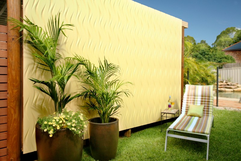 Inspiratie tuinpanelen wandpanelen tuin geel