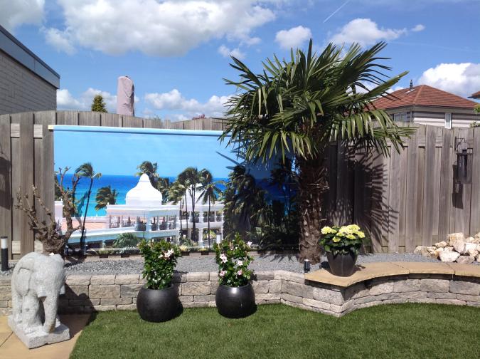 Tuinposter gras zee gebouwen